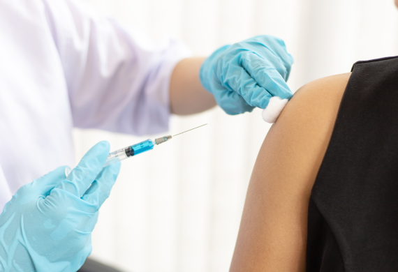 image of an arm receiving a shot