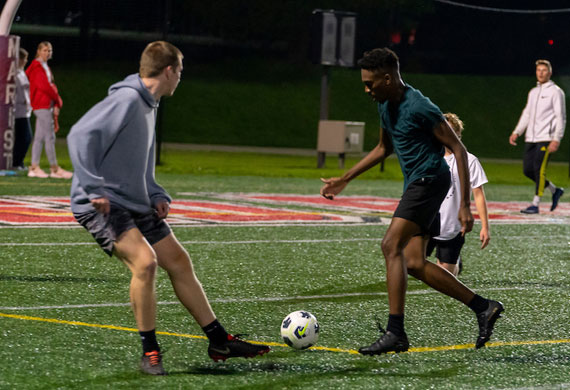 An image of students competing in intramural soccer