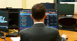 An image of student working at a computer.