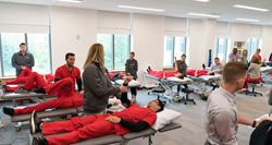 An image of students in a lab space.