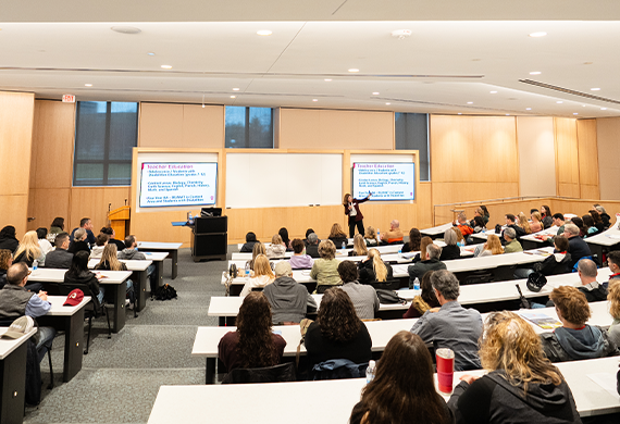 Image of Dyson Lecture Hall with Deborah Gatins instructing. 