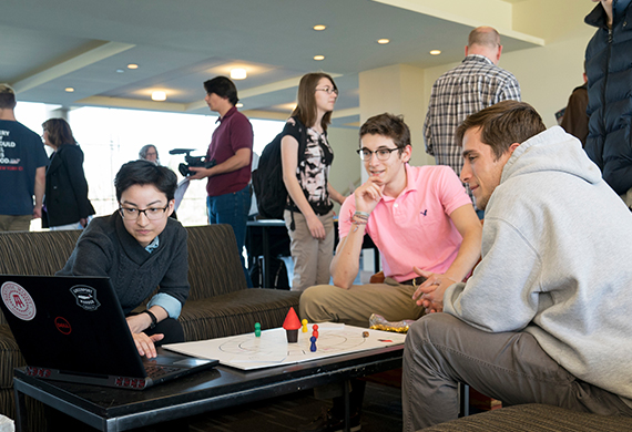 Image of interactive media students collaborating with game design students