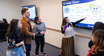 Image of Marist students working in a Psychology lab.