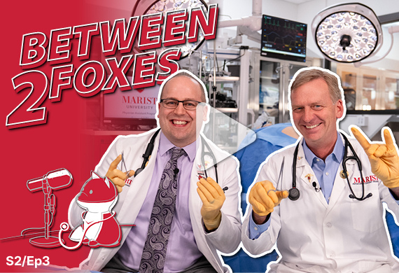 Image of Jeff Midgley and President Weinman in the Allied Health building with the 