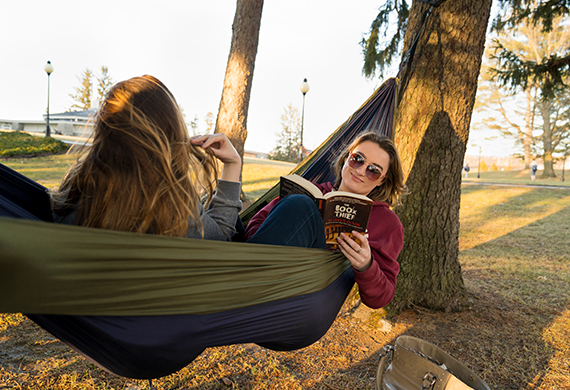 Image of Marist students reading in a hammock