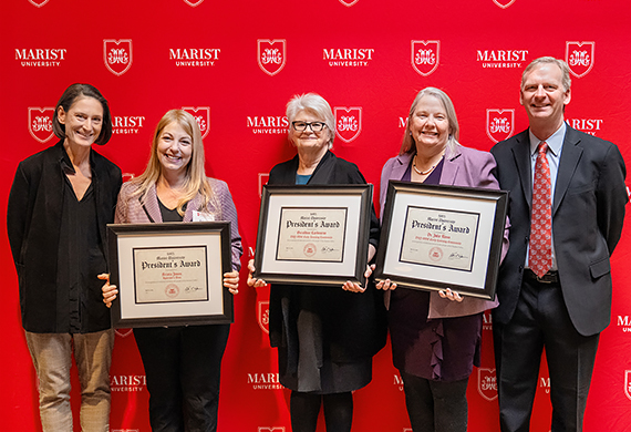 Image, from left to right, of Beth Weinman, Krista Jones, Geraldine Leybourne, Julie Riess, and Kevin Weinman at the 2025 Community Breakfast.