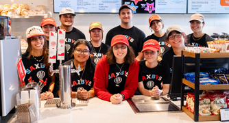 Image of students working at Saxbys.