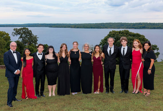 Image of Long Reach Society scholars with Genine and Michael McCormick.