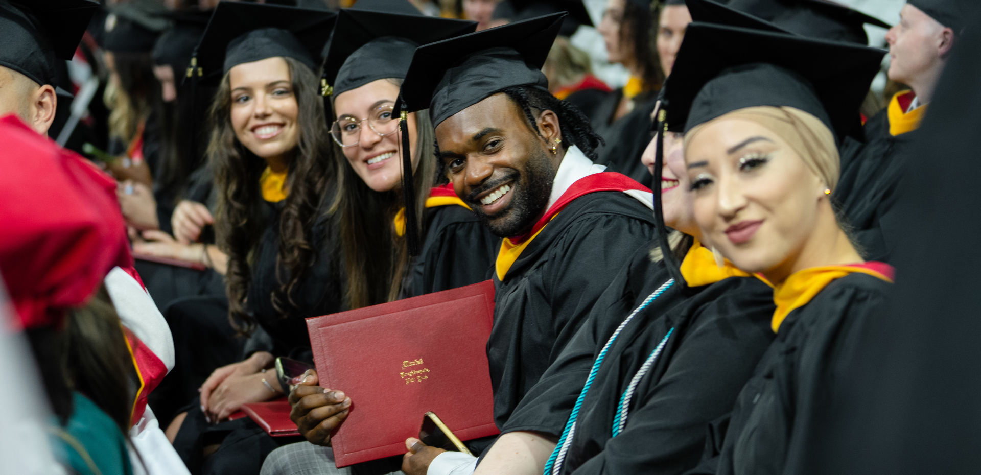 Students sitting at graduation ceremony