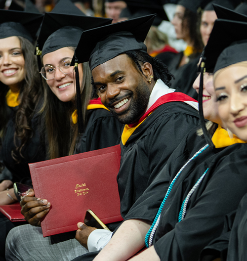 Students sitting at graduation ceremony