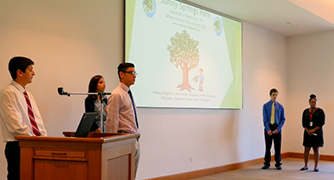 An image of students presenting. 