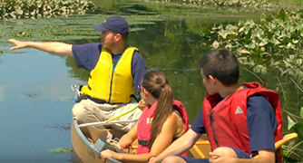 An image of students learning outside. 