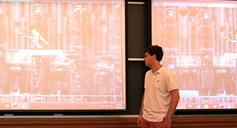 An image of a student presenting. 
