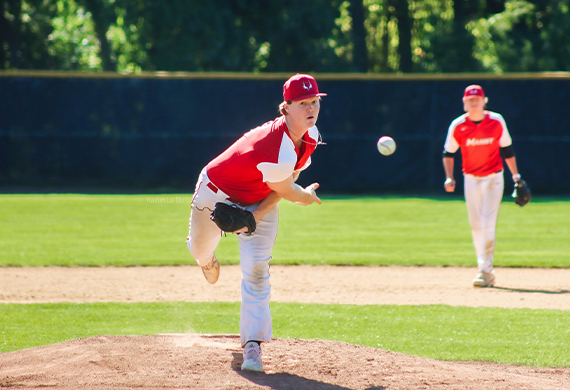 Image of Marist University's club Baseball pitcher at the mound.