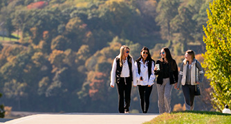 An image of people walking on campus. 