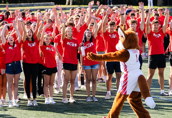Image of students taking a class photo at Tenney Stadium on move-in day.