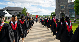 Image of students in regalia at commencement.