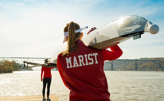 An image of students by the river. 