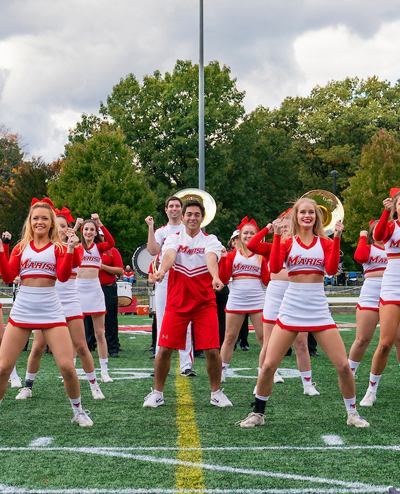 Cheerleaders performing at homecoming