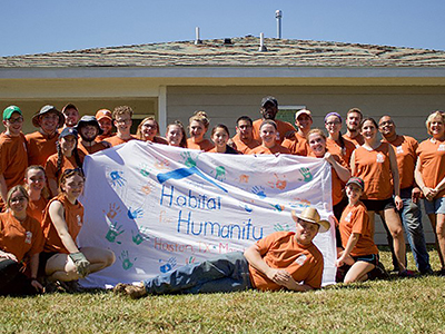 Image of Habitat for Humanity holing their sign