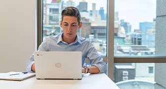 Image of student on laptop.