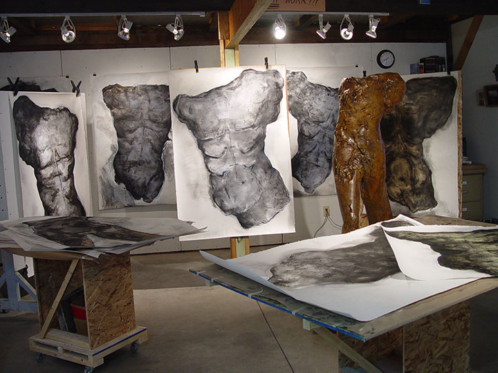 Ed Smith's studio featuring a sculpture and sketches