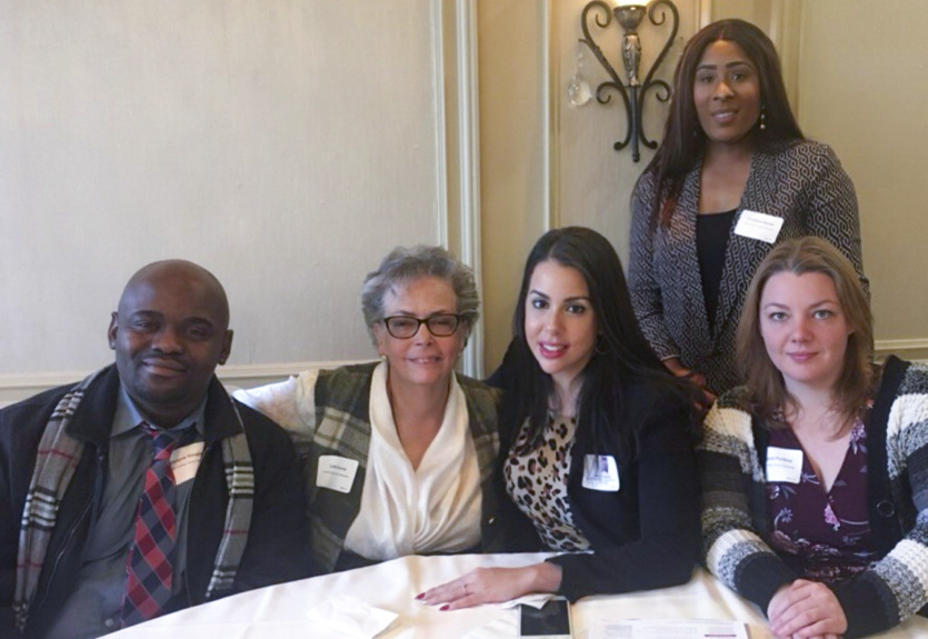 LPP staff members are (left to right) Dwayne Douglas ’06, site coordinator and Poughkeepsie High School graduate; Linda Scorza, operations assistant, a Poughkeepsie native and a 50-year Marist employee who is retiring this year; Melinda E. Martínez ’07/’13MA, director; Christine Smack (top right), high school coordinator, a Poughkeepsie native and Poughkeepsie High School graduate; and Crystal Purfield, family engagement coordinator and former LPP intern.