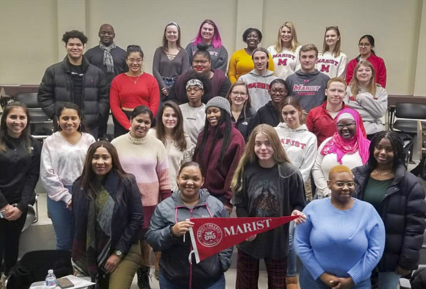 Marist students (shown with LPP staff) tutor, intern, and mentor in the LPP program. 