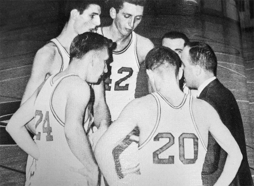 Tom Wade with basketball players