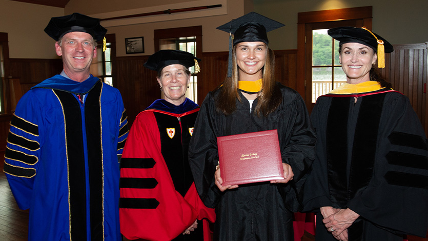 From left to right: President Weinman, Calista Phippen, Dr. Kodat, Dr. Gatins. Photo by Al Nowak/On Location for Marist College. 
