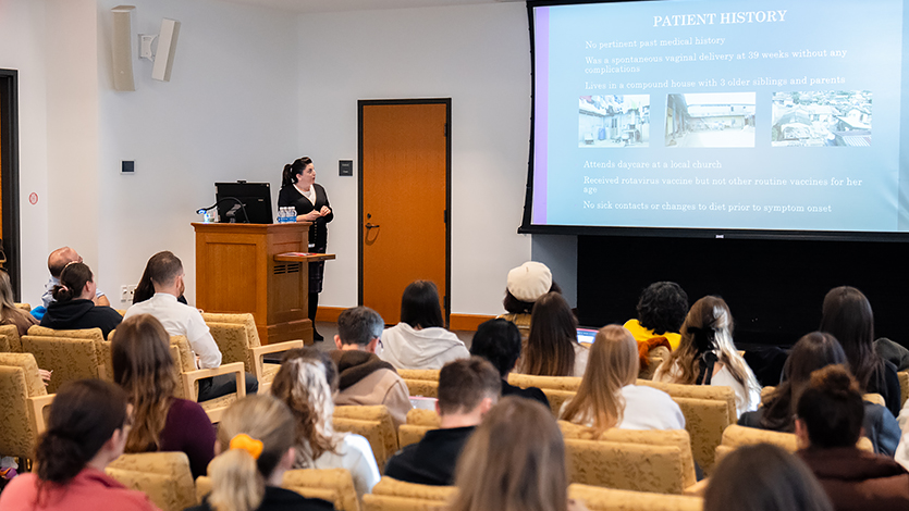 Image of Caitlin Conner presenting her experience and research findings at the Murray Student Center after returning to Marist’s Poughkeepsie campus.