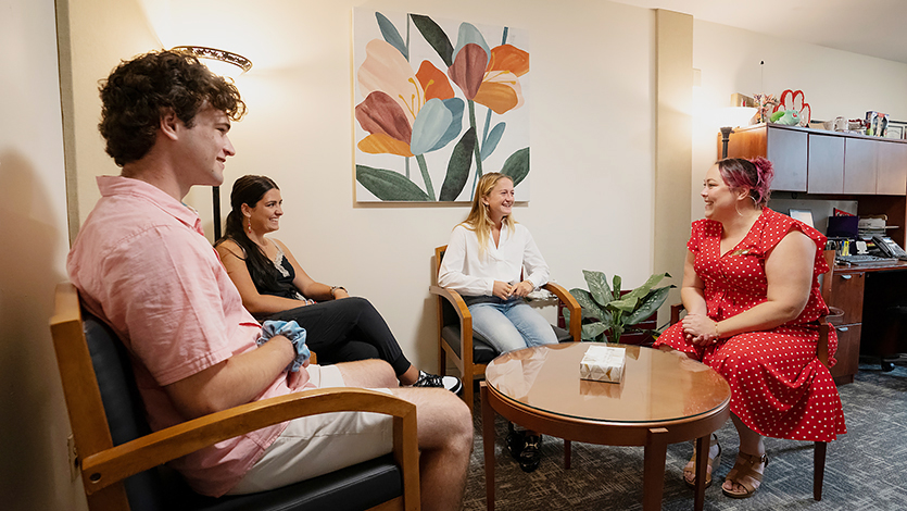 Dr. Marisa Moore with students in the Counseling Center
