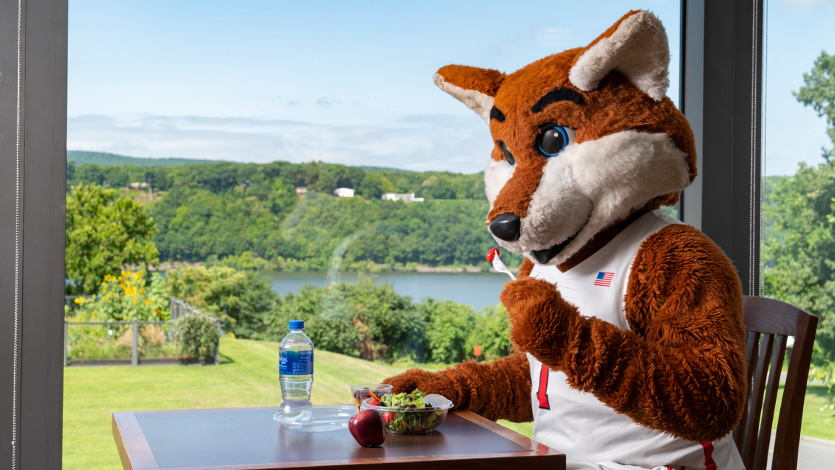 Image of Frankie the Fox in dining hall.