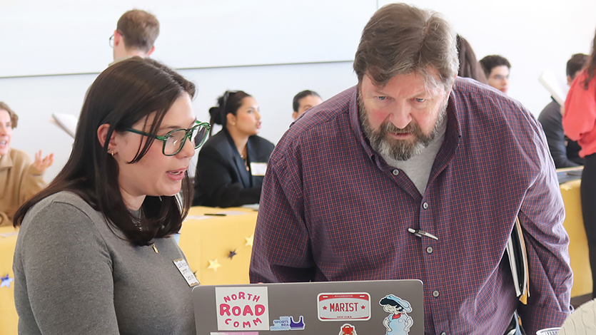 Image of Journalism major Lola Piccolo ’24 with Roger Connor, Internship Placement Coordinator in the School of Communication and the Arts.