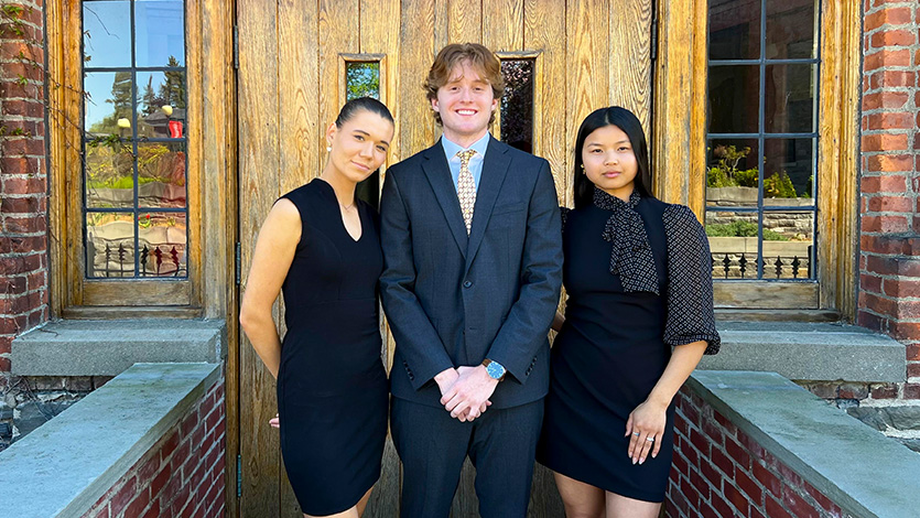 Debate Society Students Dasha O’Brien ’26, Matthew McCann ’27, and Anna Talamini ’27.