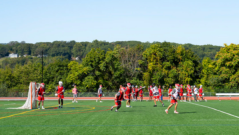 DI Men’s Lacrosse practicing on the new turf field at Gartland Commons.