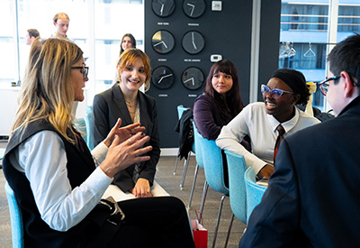 Image of students networking with Paramount employees.