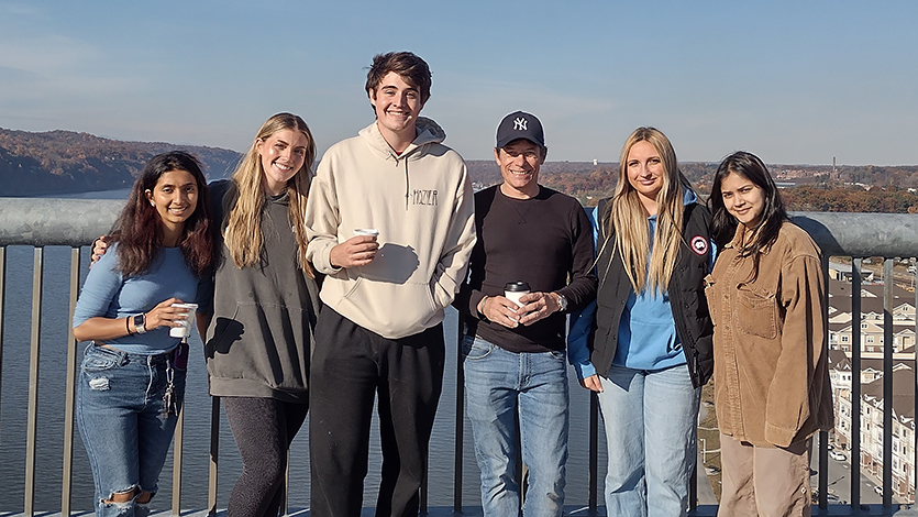 Image of Colin McCann and commuter students. 