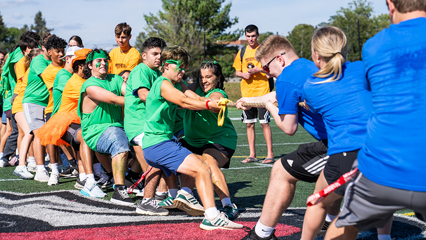 Image of First-year students playing tug of war for Welcome Week Red Fox Rumble. Photo by Bobby Oliver/Marist University.