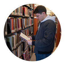 Image of a student in the James A. Cannavino Library.