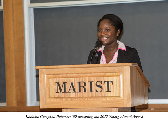 An image of Kadeine Campbell Peterson '09 accepting the 2017 Young Alumni Award