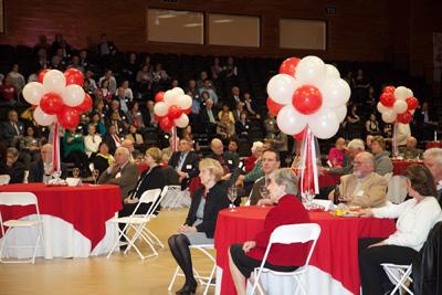 Image of a party in the McCann Center's gym.