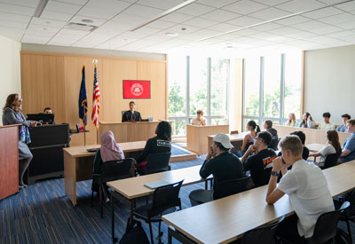 Image of students in the mock courtroom.