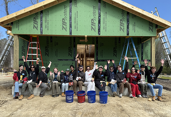 Image of Habitat for Humanity holing their sign