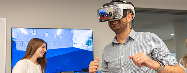 Marist University image: Dr. Mohammadali Koorank Beheshti uses virtual reality goggles.