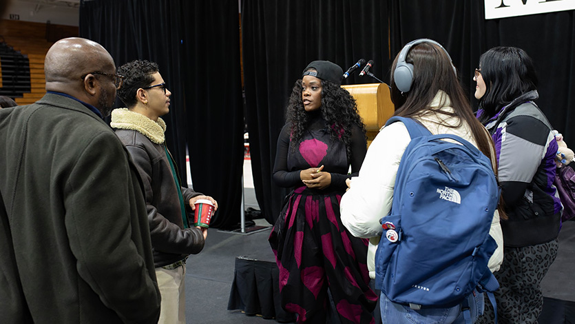 Marist University Image: Ebony Stewart speaking with students and staff.