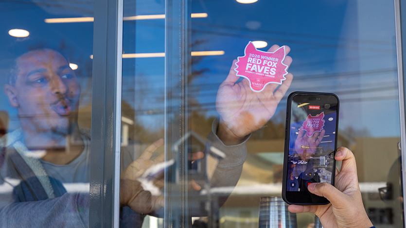 Image of Red Fox Fave sticker on the window at Ready Coffee.