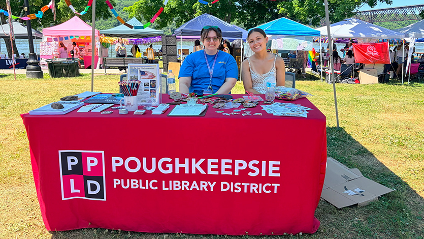 Image of Teen Librarian Hannah Ricottilli (left) and Tori&nbsp;Hegenauer '27 tabling at the Poughkeepsie Pride Parade. Photo&nbsp;by&nbsp;Kira Thompson.&nbsp;