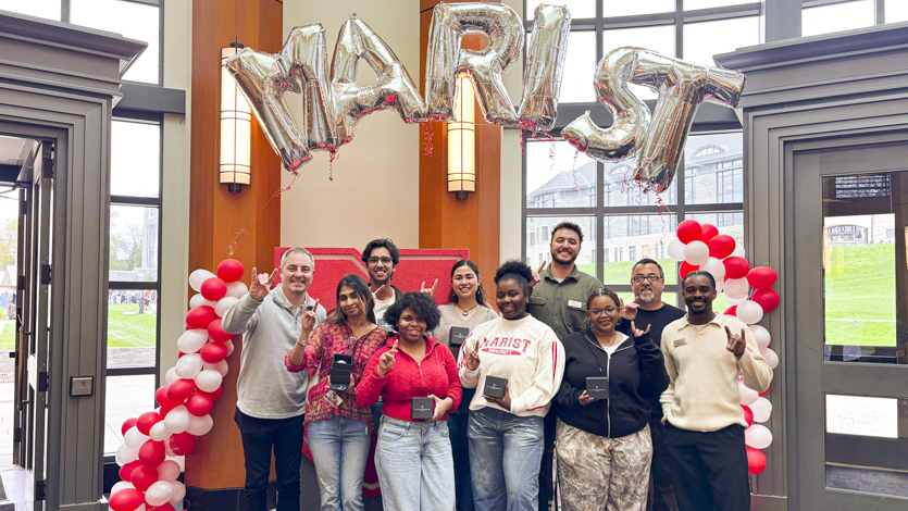 Image of members of the first cohort of UWC students and Marist staff at last year’s UWC Globe Ceremony.