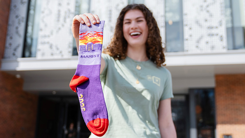 Image of Ryann Lambert ’26 designed this year’s Red Fox socks for the Day of Giving!